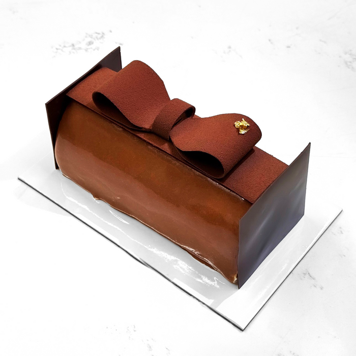 Bûche de Noël | Chocolat, spéculos, noisette & agrumes | Édition limitée